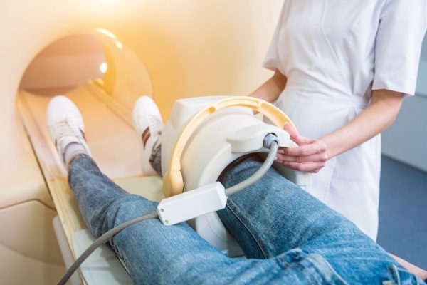 Radiologist prepares the patient for an MRI knee examination at IPMC Philadelphia